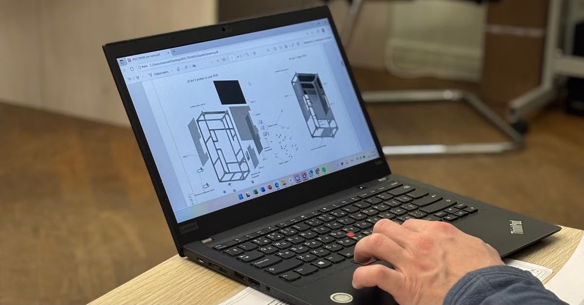 Structural engineers reviewing a 3D model of a building